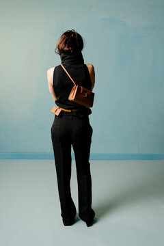 Minimalist Black Outfit With Brown Leather Bag