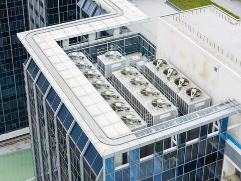 Rooftop HVAC Condenser Units on Glass Skyscraper