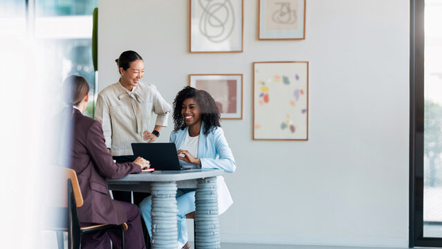 Diverse Colleagues Collaborating in Casual Business Meeting
