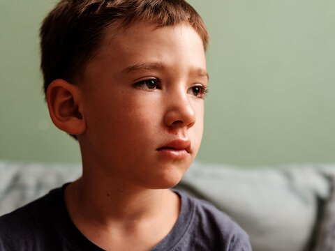 Sad Boy with Injured Face Looking Away