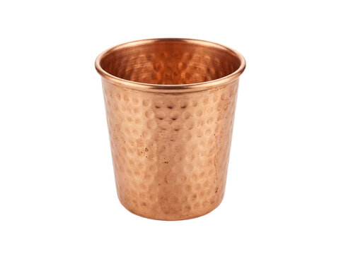 Hammered copper cup on transparent background provides elegant metallic texture for kitchenware product mockups or rustic beverage presentations in food design projects.