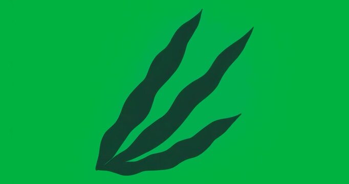 Tech designers placing dark leaf shapes on transparent background showing pixelated blue gradient