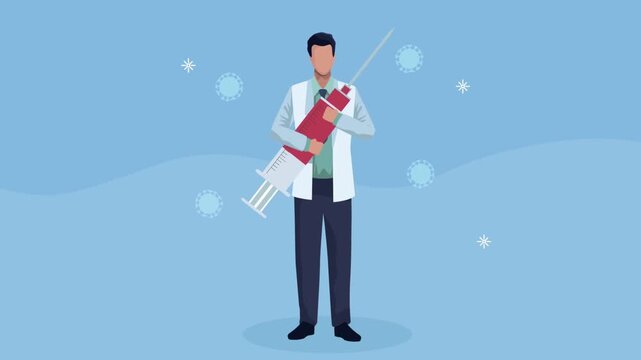 Male doctor holding large medical syringe for vaccination and immunization concept