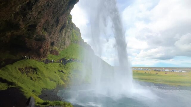 Seljalandsfoss Waterfall with Path Behind Falling Water in Iceland