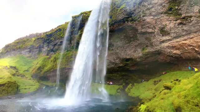 Seljalandsfoss Waterfall with Path Behind Falling Water in Iceland