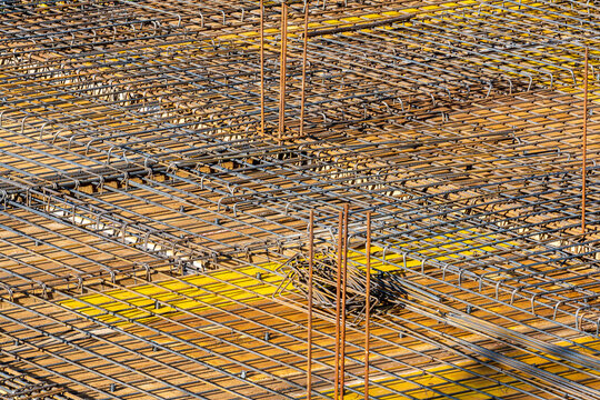 Reinforced concrete rebar grid construction texture.