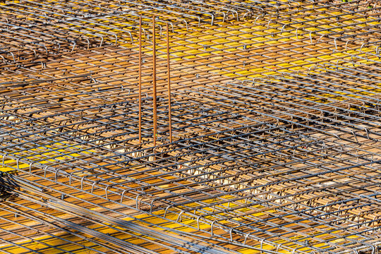 Reinforced concrete rebar grid construction texture.