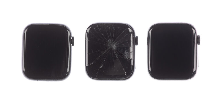 cracked black digital wristwatch isolated on a white background