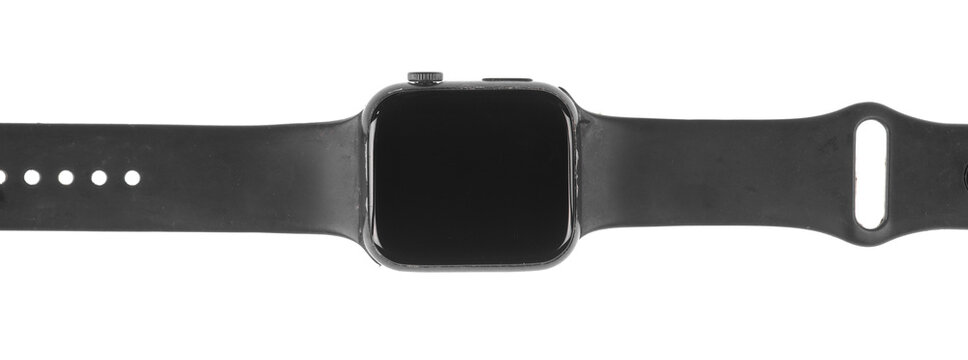 Vintage electronic wristwatch with a strap, isolated on a white background.