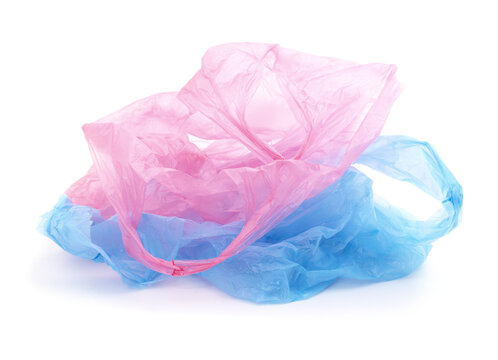 Crumpled pink and blue plastic shopping bags isolated on white background.