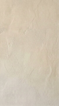 Smooth ivory plaster surface with subtle hand troweled texture, neutral minimal background