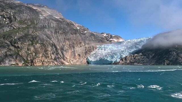 A 4k smooth video panning a glacier at Prince Christian Sound, Greenland, in summer. 