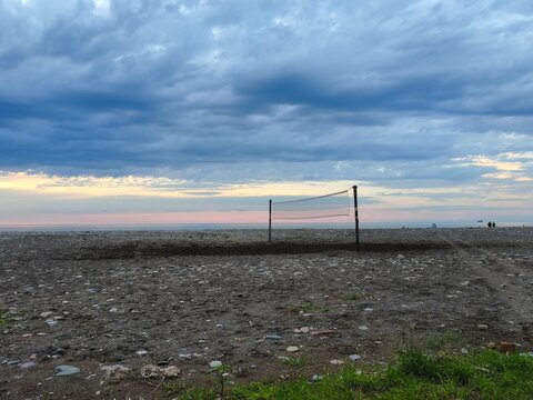 Volleyball net on the sea beach.
