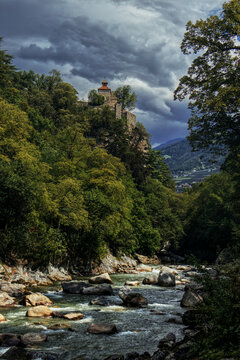Castel San Zeno perched on the rock above the Passirio River in Merano.
