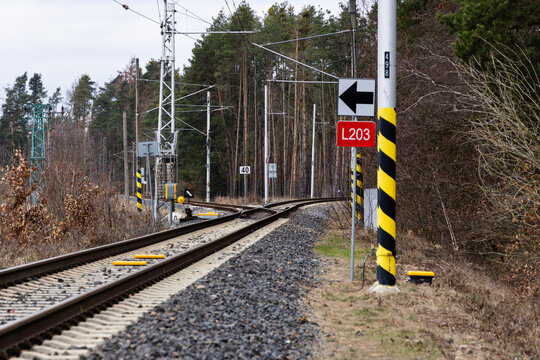 Electrified Railway Track with Switch and Traffic Signs