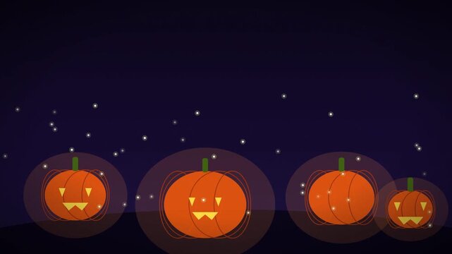 Glowing jack-o-lantern pumpkins in dark pumpkin patch on Halloween night