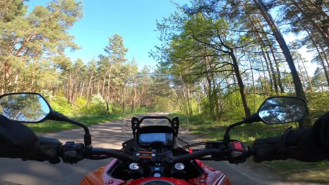 Riding a motorcycle on forest road