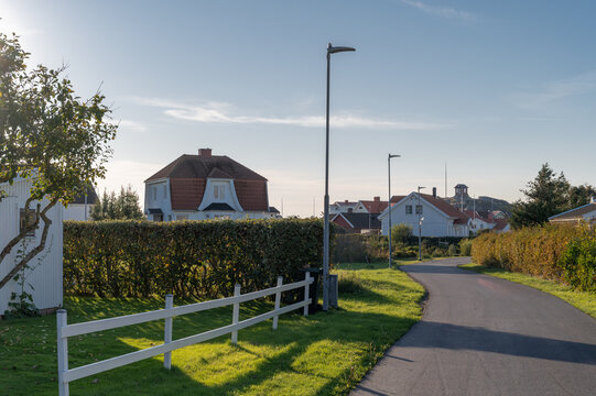 Cityscape with white house on street in Vrango island