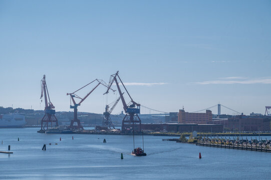 View from bridge on sea port with cranes in Goteborg