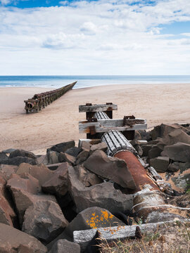 Outfall and waste disused pipe at Cambois, Northumberland, UK.
