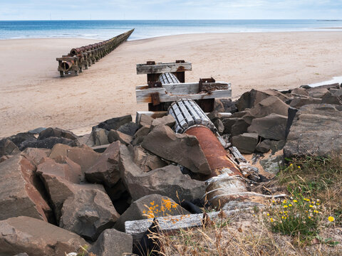 Outfall and waste disused pipe at Cambois, Northumberland, UK.
