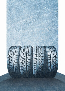 Car tires with on the autumn road, isolated on free ice, frozen background.