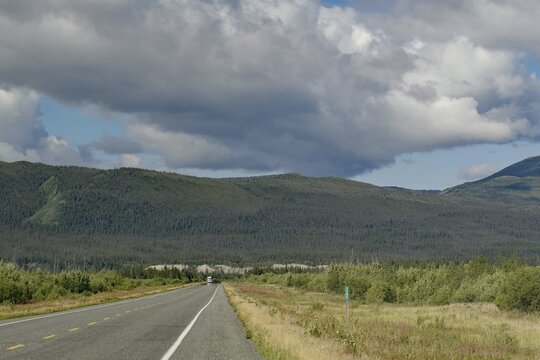 Endless road, with single lorry, forest, wilderness, Alaska Highway, Yukon Territory, Canada