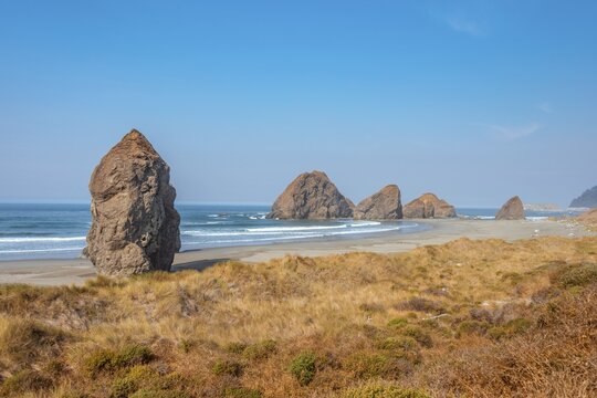 View over sandy beach and large monolithic rocks, coastal landscape, Pistol River Middle, Ariya's Beach, Oregon, USA