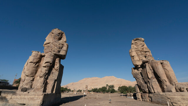 Colossi of Memnon, two large stone statues of the Pharaoh Amenhotep III, Luxor, Egypt