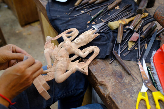Artisans Angkor is a social business with the aim of providing employment for rural youth while preserving traditional Khmer craftsmanship. Wood carving. Siem Reap. Cambodia.