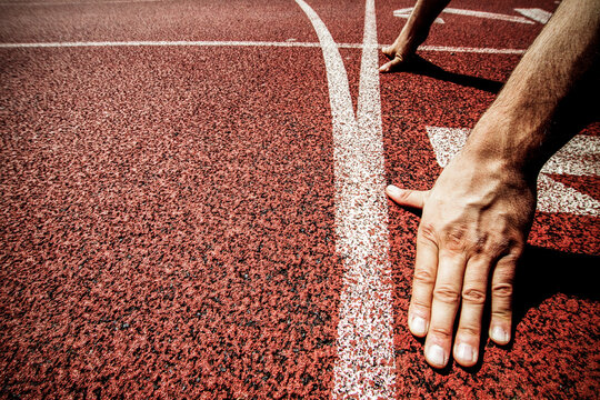 hands on starting line achievement and success