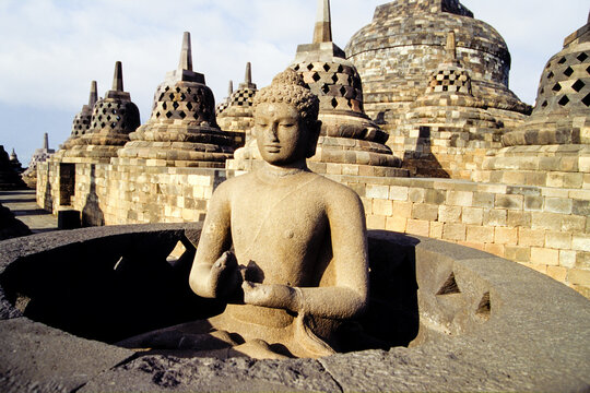 Buddha statue,Borobodur Temple,Java island,Greater Sunda Islands,Republic of Indonesia,Southeast Asia and Oceania