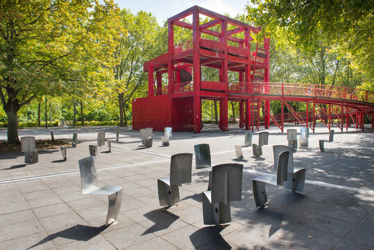 Chairs and playful structure of the Jardin des Voltiges, Parc de la Villette, 19th arrondissement of Paris, Ile de France, France