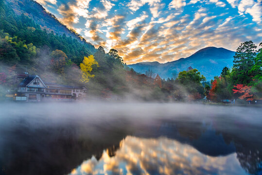 Stunning morning mist at Lake Kinrin at sunrise in autumn, Yufuin, Oita, Kyushu, Japan
