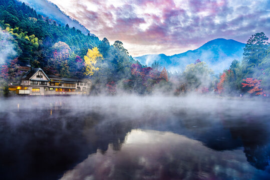 Stunning morning mist at Lake Kinrin at sunrise in autumn, Yufuin, Oita, Kyushu, Japan