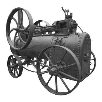 Vintage black steam engine machine on wheels