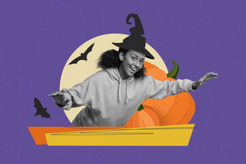 Fototapeta premium Joyful Expression. Happy Young Black Female Celebrating Halloween In Costume, Pretending To Fly With Broom In Festive Setting, Surrounded By Pumpkins. Halloween Concept.