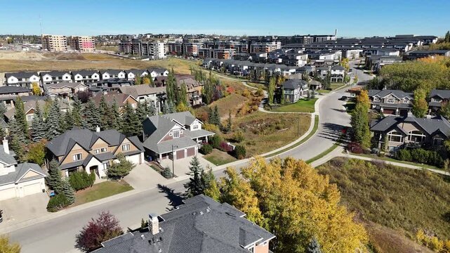 Aerial view of beautiful suburban homes in Autumn in Calgary, Alberta.