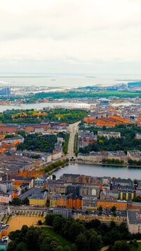 Vertical video. Copenhagen, Denmark. PARKEN - largest football stadium in Denmark, national stadium of Denmark for Danish national team, home arena for Copenhagen football club. Drone footage. Rich c