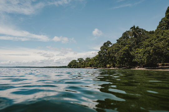 View of the lush tropical coastline and calm waters in Puerto Viejo de Talamanca, Limon Province, Costa Rica.