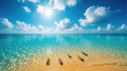 Fototapeta premium Aerial view of tropical beach with crystal clear turquoise water, golden sand. Small people swim, float in shallow ocean. Bright sun shines in blue sky with white clouds. Perfect summer vacation at