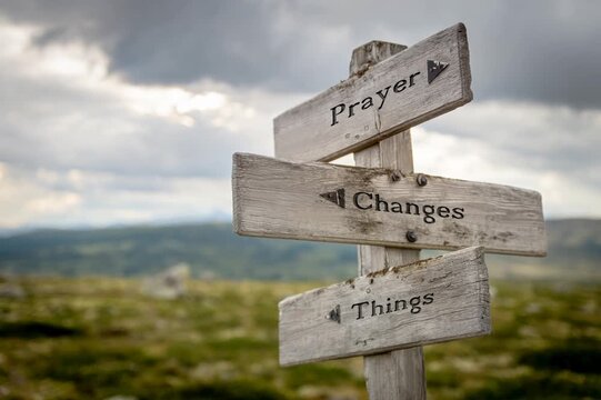 prayer changes things text on signpost. timelapse 4k animation.