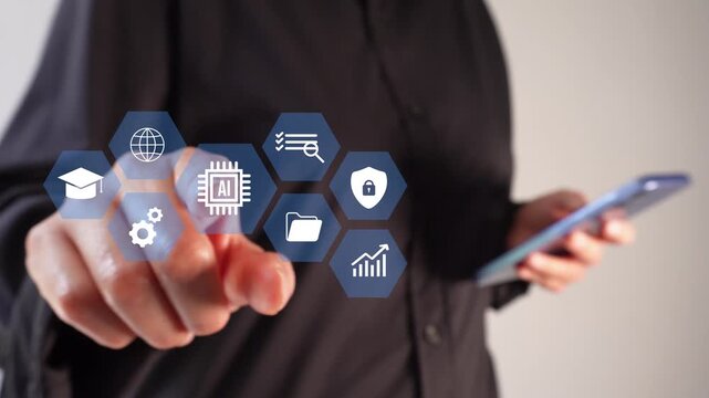 A businesswoman holding a phone while pointing toward an animation of icons representing data analysis and study for artificial intelligence.
