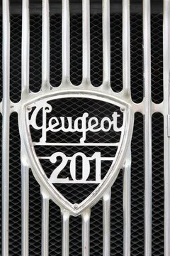 Dax, France - June 4, 2017: Peugeot 201 logo on a car. The Peugeot 201 is a car produced by Peugeot between 1929 and 1937