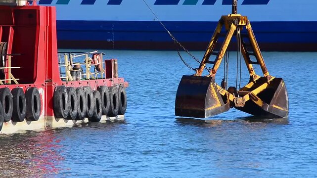 Dredger working in Ystad harbor, Sk&aring;ne county, Baltic Sea, Sweden, Scandinavia