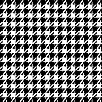 A classic black and white houndstooth pattern creating a sharp and timeless geometric visual.