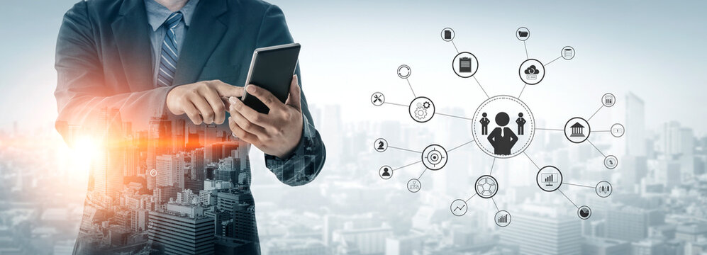 A concept of centralized business management and corporate strategy. A leadership team connecting to all functions like finance, operations, and planning. Motif