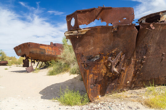Rusting, abandoned vessels in the Moynaq Ship Graveyard, Uzbekistan. Formerly part of the Aral Sea, this area became the Aralkum Desert as the waters receded