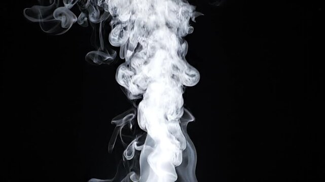 White steam rising and curling slowly on a black background