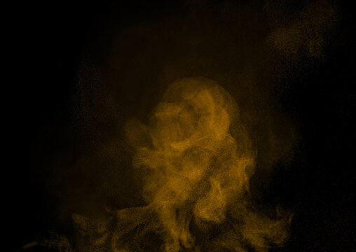 Golden powder cloud exploding against a black background, creating a luxurious abstract texture with fine particles, shimmering dust, dramatic motion, rich color, and elegant visual energy.